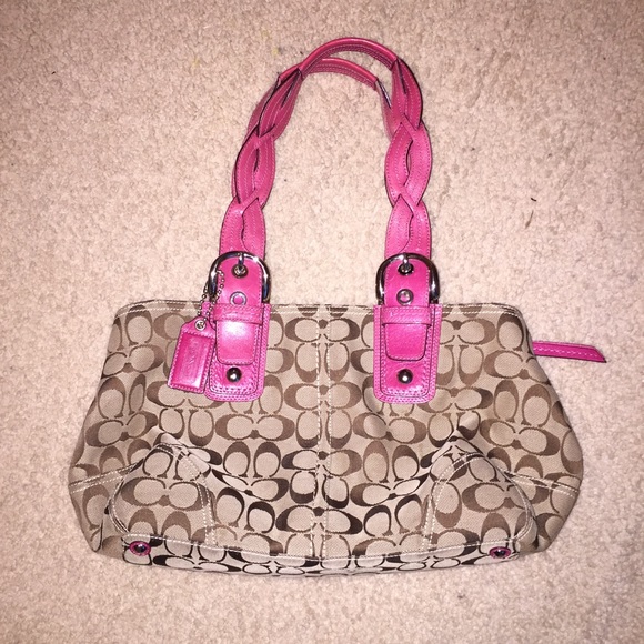 NWOT Authentic Coach purse with pink accents!