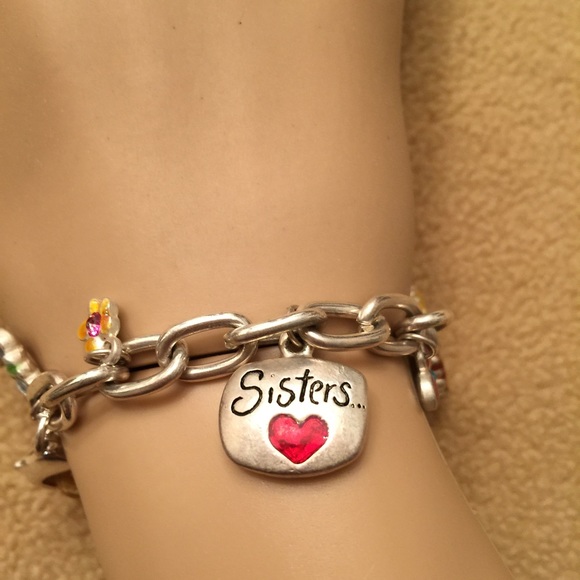 "REDUCED " 7.5" charm bracelet in silver