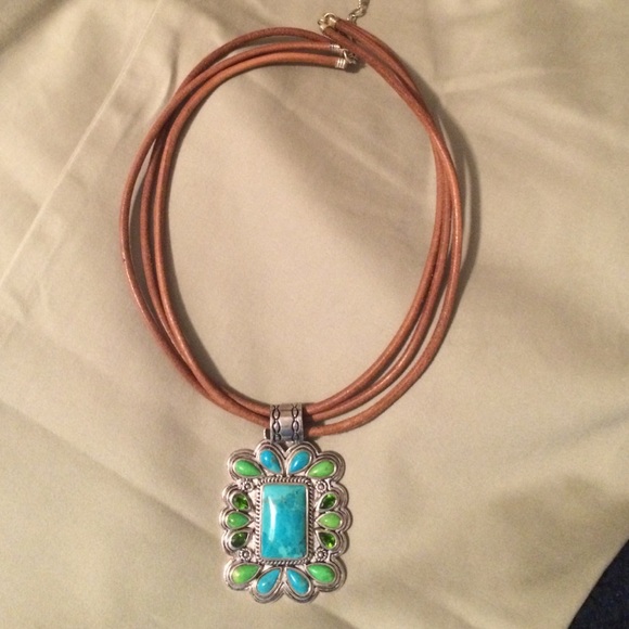 Brown leather necklace with stone pendant