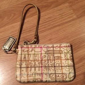 Authentic Coach wristlet.