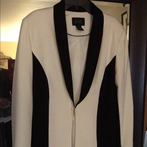 Donna Moore. Cream and black jacket