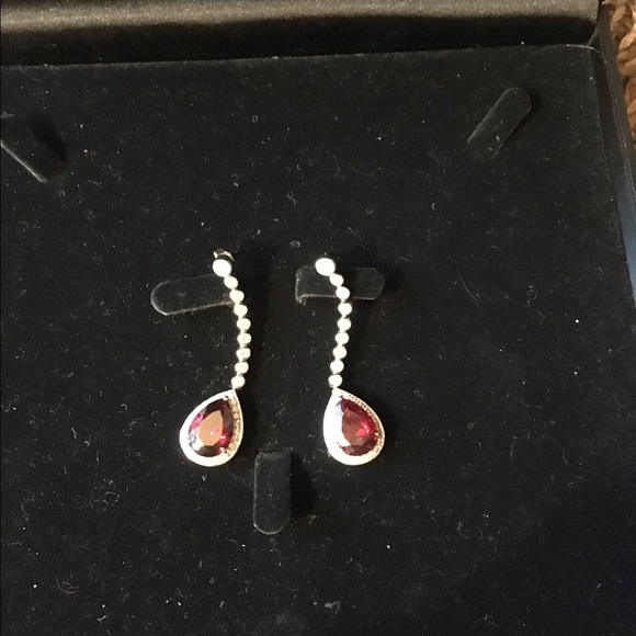 Feri Moshe earrings.