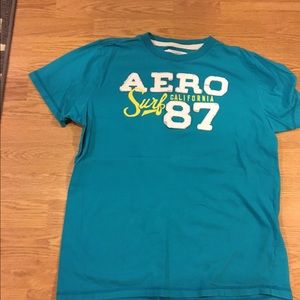 Aqua colored men's T shirt.