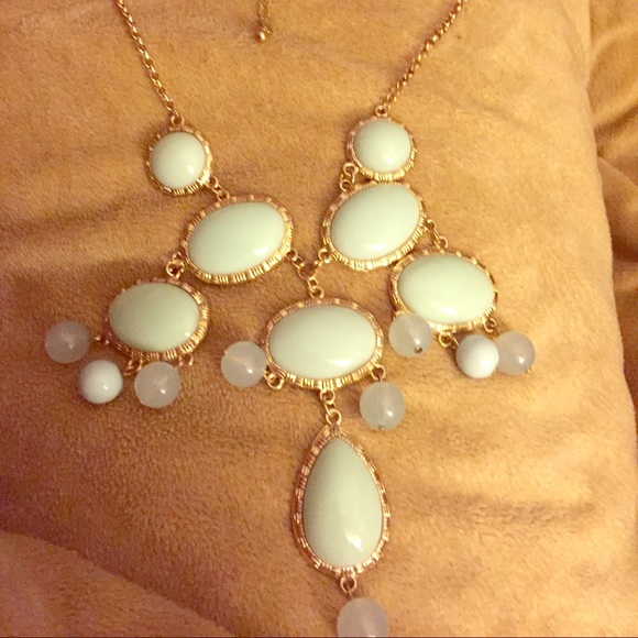 Light teal and gold necklace.