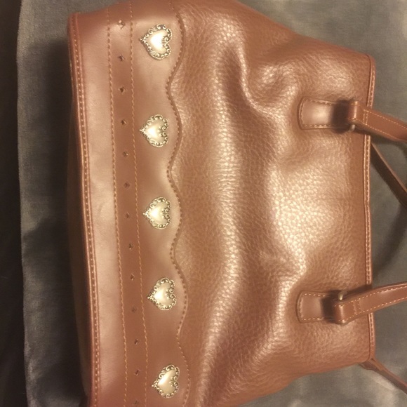 Fossil Other - A gently used fossil purse it is a relic