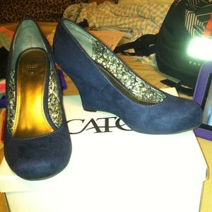 Closed toe navy blue wedges