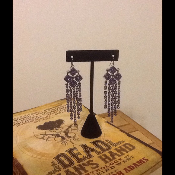 Pretty purple crystal metal earring with swing!