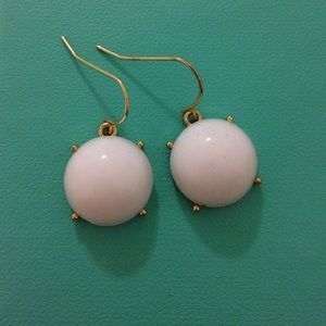 White dangly earrings