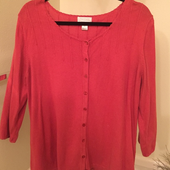 Button up sweater/ more orange than the pic.