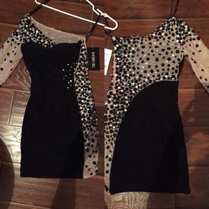 Tight sheer black Sherri Hill dress. NEVER WORN!