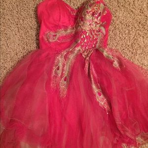 Pink strapless prom  dress. Fitted for a size 0