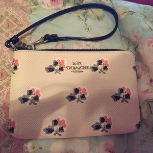 Adorable and girly never used Coach Wristlet