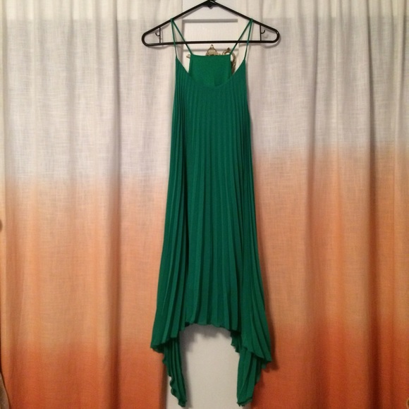 Green accordion pleated dress