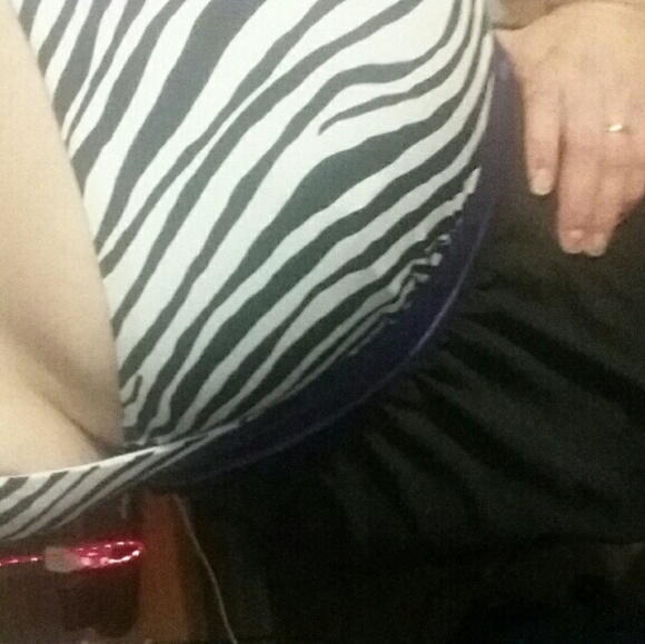 Steamy  black dresswith zebra print bust.