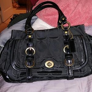 Coach black signature Saturday Tote.