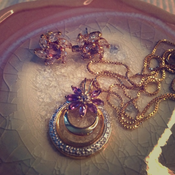 Gold necklace with purple and white stones