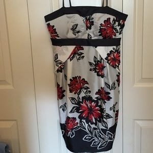 Strapless white dress with black and red flowers