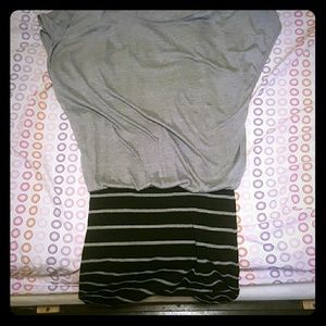 Loose shirt on top attached to striped mini skirt