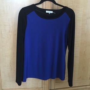 Two color top in excellent condition.