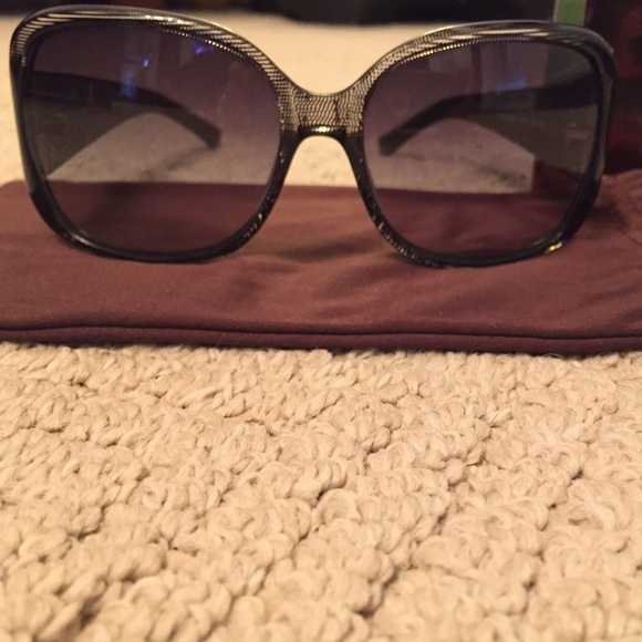 Tory Burch sunglasses.