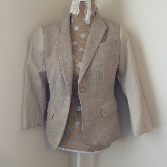 Tan blazer with leather like sleeves