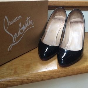 Christian Louboutin patent leather black heels.