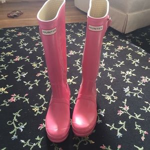 Tall pink Hunter boots