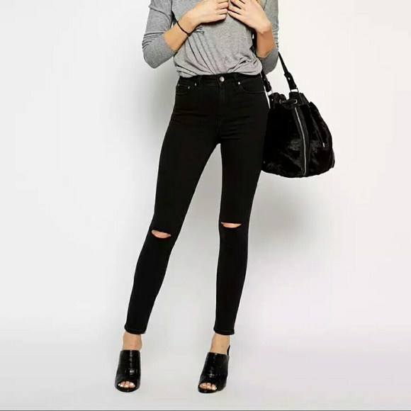 High rise black ripped knee skinnies