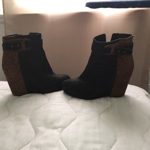 80%20 black wedge bootie with animal print detail