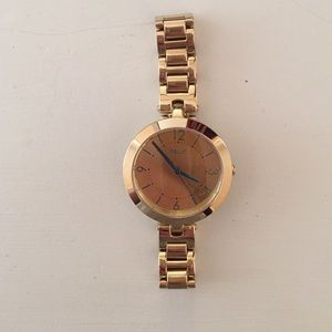 Small gold watch