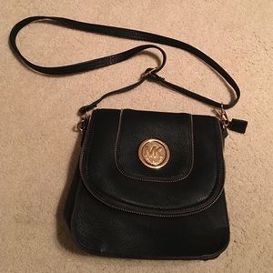 Michael Kors side purse. Never used brand new.