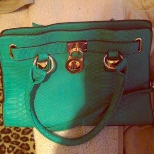 Turquoise green fashion purse from Body Central