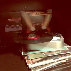 Battery operated record player with records