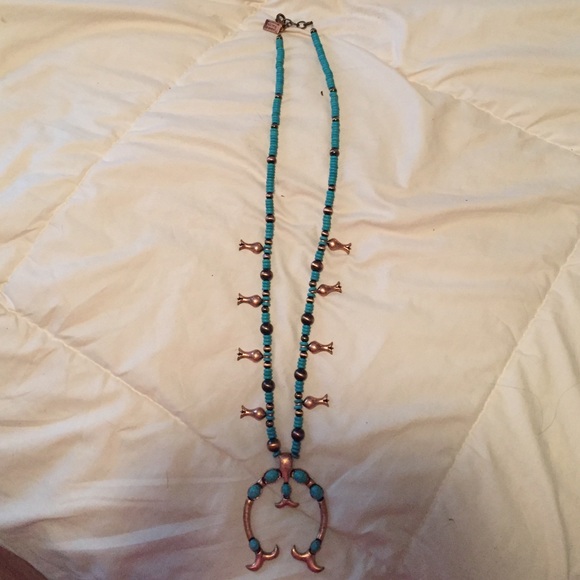 Bronz and turquoise squash blossom