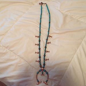 Bronz and turquoise squash blossom