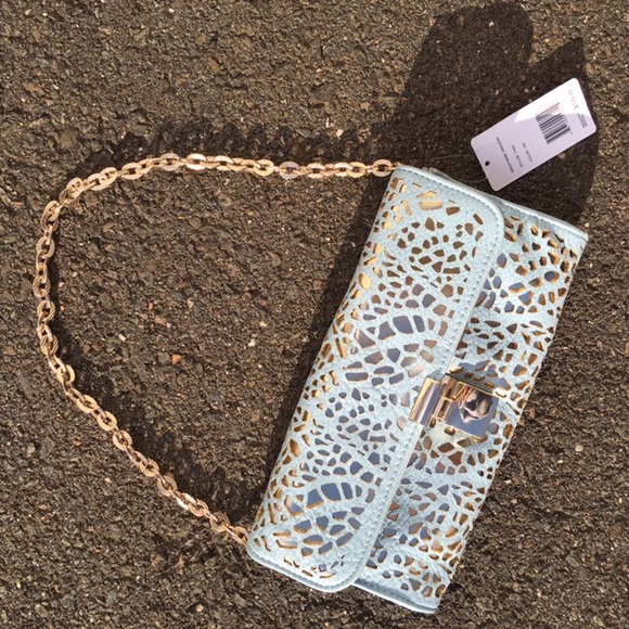 Clutch with laser cut detail