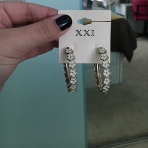 Gold flower hoop earrings