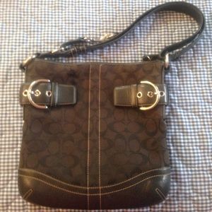 Over the shoulder black Coach purse