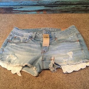 Denim cut offs with lace pockets