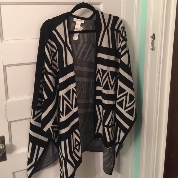 NWOT. Black and white poncho. Never worn.