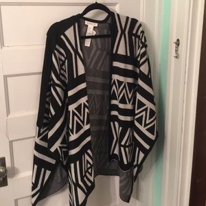 NWOT. Black and white poncho. Never worn.