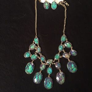 Statement necklace and earrings.