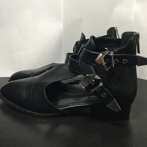 Edgy cutout booties.