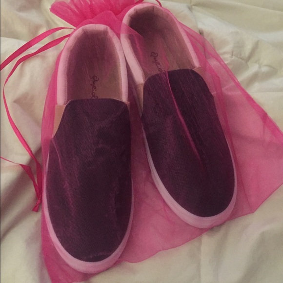 Black and white slip ons