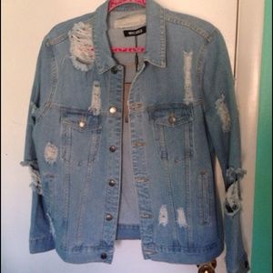 Oversized stressed ripped denim jacket