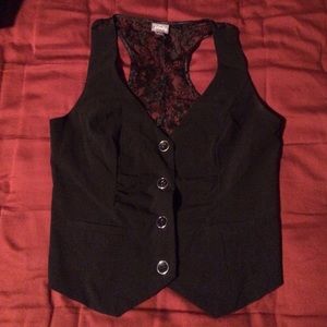 Black vest.