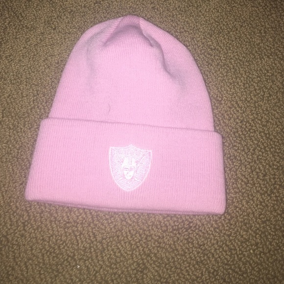 Never worn pink Raiders beanie