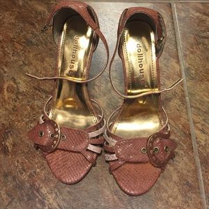 Ankle strap high heels.