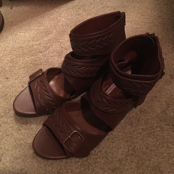 Brown sandals with buckles.