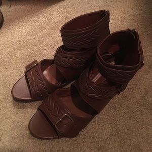 Brown sandals with buckles.